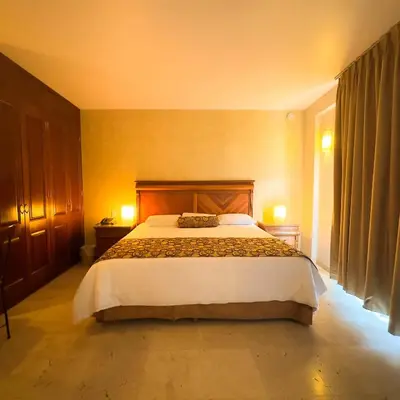 Cama o camas de una habitación en Quinta Roca Hotel