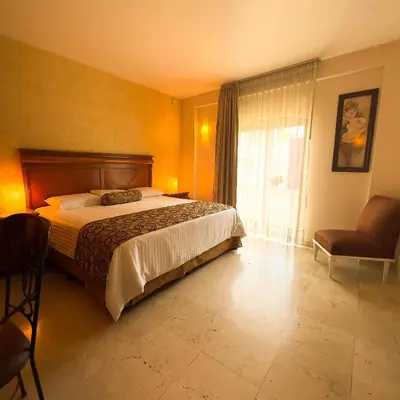 Cama o camas de una habitación en Quinta Roca Hotel