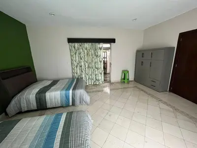 Cama o camas de una habitación en Agradable Habitación Ojo de agua
