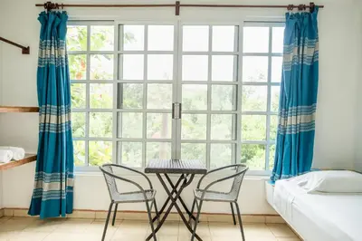 Cama o camas de una habitación en Casa Mazunte Tierra Viva