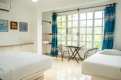 Cama o camas de una habitación en Casa Mazunte Tierra Viva