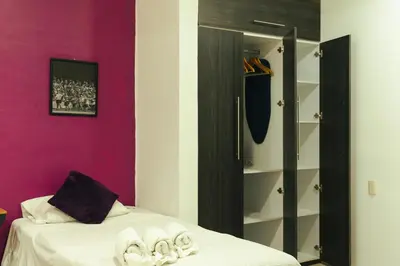 Cama o camas de una habitación en Casa Don José: VIOLETAS Suite