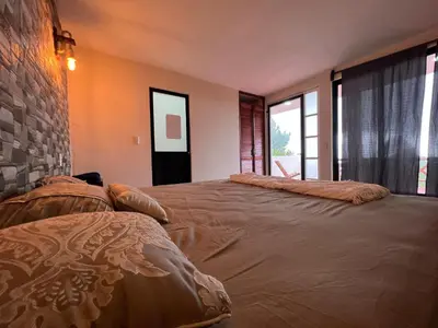 Cama o camas de una habitación en Cabañas el gigante