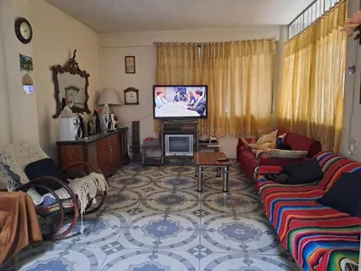Una televisión o centro de entretenimiento en Casa Martha