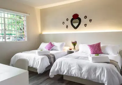 Cama o camas de una habitación en Dazzling house in the heart of Coyoacan/12 guests