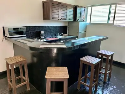 Una cocina o zona de cocina en Hotel Aqualuna Departamento #aussiepipe