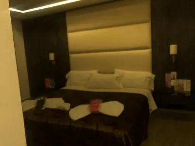 Cama o camas de una habitación en HOTEL M ELITE GOLDEN