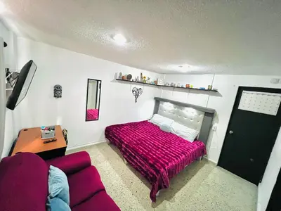 Cama o camas de una habitación en B Habitaciones CRT