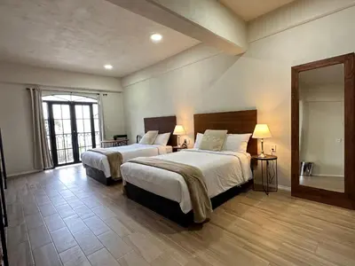 Cama o camas de una habitación en Hotel Santa María