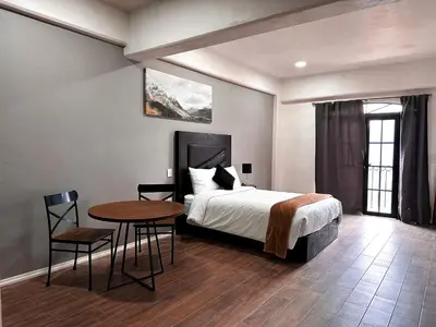 Cama o camas de una habitación en Hotel Santa María
