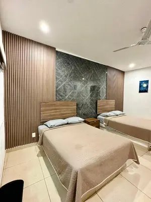 Cama o camas de una habitación en Hotel Boutique Luciérnaga Xochitepec