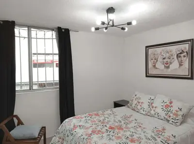 Cama o camas de una habitación en Departamento Cerca del Aeropuerto/ Buena Ubicación