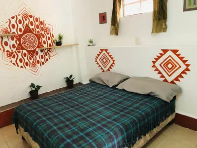 Cama o camas de una habitación en Bungalito en Cuernavaca
