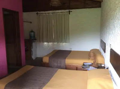 Cama o camas de una habitación en Cabanas la Chicharra