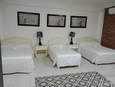 Cama o camas de una habitación en HOTEL OBREGON