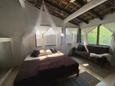 Cama o camas de una habitación en AQUA CEIBA Hotel Spa Aventuras y Eventos