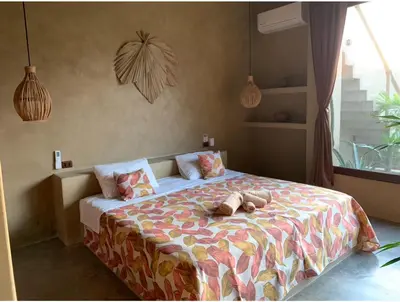 Cama o camas de una habitación en Casa Maloya alberca y vista al mar