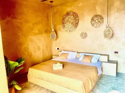 Cama o camas de una habitación en Casa Maloya alberca y vista al mar
