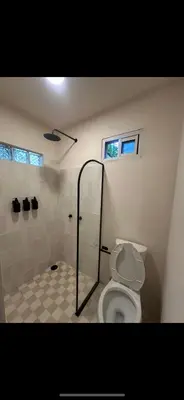 Un baño de PointBreak Surfhouse