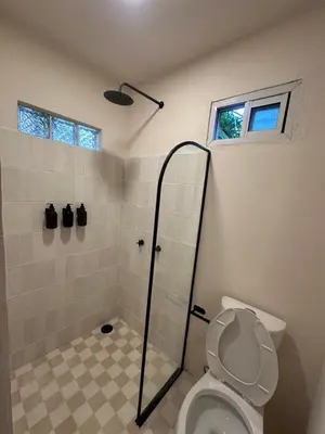 Un baño de PointBreak Surfhouse