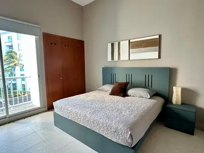 Cama o camas de una habitación en Casa del Sol Lujoso Departamento en Acapulco