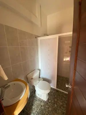 Un baño de Casa Suites Minizoo