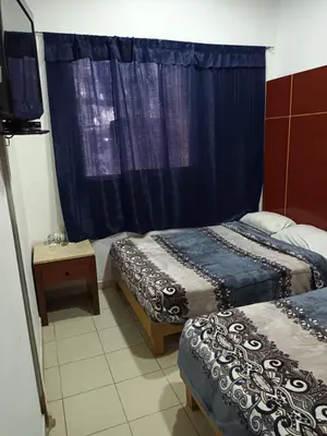 Cama o camas de una habitación en HOTEL PUERTO MEXICO 2
