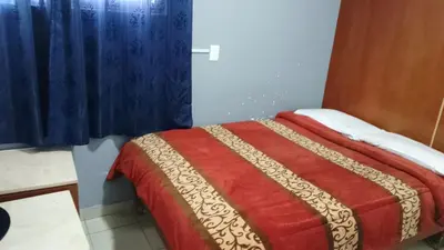 Cama o camas de una habitación en HOTEL PUERTO MEXICO 2