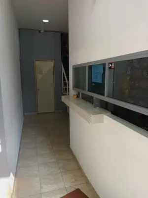Una televisión o centro de entretenimiento en HOTEL PUERTO MEXICO 2
