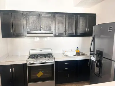 Una cocina o zona de cocina en Tiki’s Penth