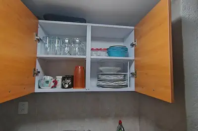 Una cocina o zona de cocina en Departamento con vista al mar, albercas y juegos