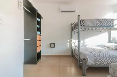 Cama o camas de una habitación en Maktub Casa AcaCancún