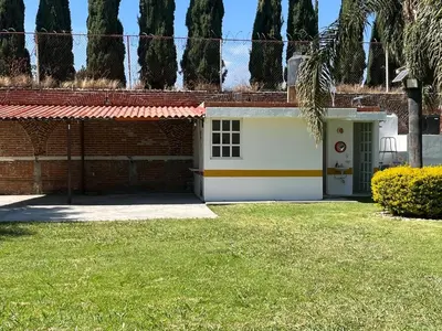 Jardín al aire libre en Casa de descanso alberca climatizada