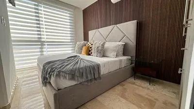 Cama o camas de una habitación en Departamento frente a la bahía