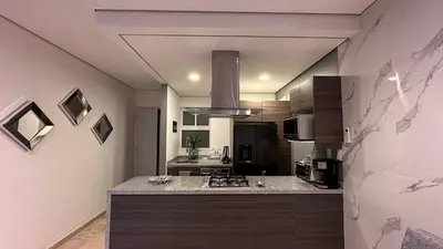 Una cocina o zona de cocina en Departamento frente a la bahía