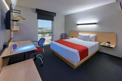Cama o camas de una habitación en City Express by Marriott Tehuacan