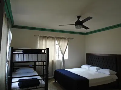Cama o camas de una habitación en Paulina Youth Hostel
