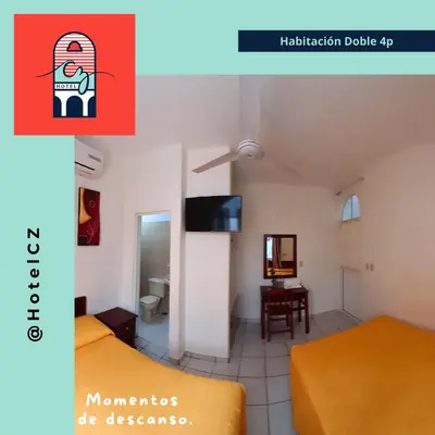 Una televisión o centro de entretenimiento en Hotel CZ