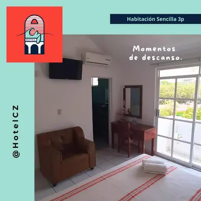 Una televisión o centro de entretenimiento en Hotel CZ