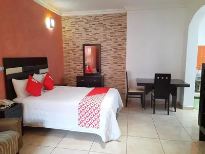 Cama o camas de una habitación en Hotel Posada Del Parque