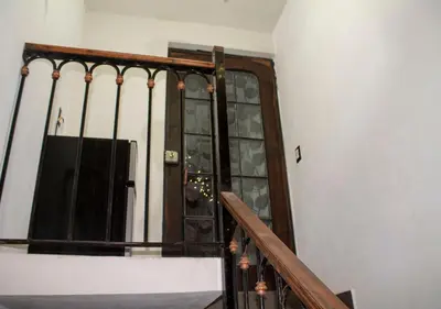 Una televisión o centro de entretenimiento en Casa en el centro de Taxco con alberca.