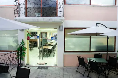 Una televisión o centro de entretenimiento en Hotel Tlaxcala