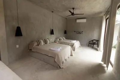Cama o camas de una habitación en Naari Cabañas Boutique
