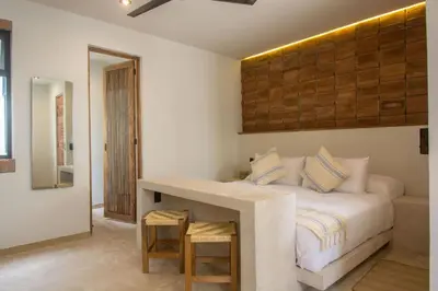 Cama o camas de una habitación en Aymara Punta Zicatela