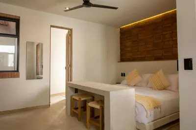 Cama o camas de una habitación en Aymara Punta Zicatela