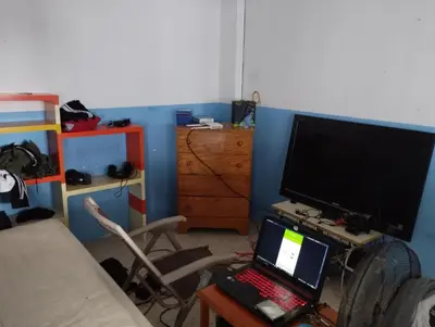 Una televisión o centro de entretenimiento en Moon Rest Weekend