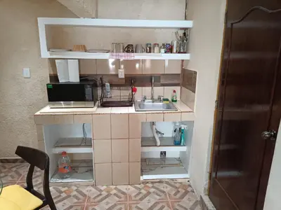Una cocina o zona de cocina en Departamento Aeropuerto CDMX
