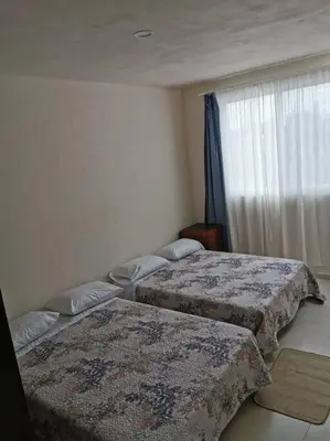 Cama o camas de una habitación en Hermosa Casa Alberca Climatizada por Paneles Solares