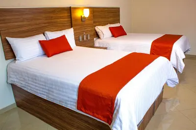 Cama o camas de una habitación en La Casa del Reloj - Zona de Hospitales