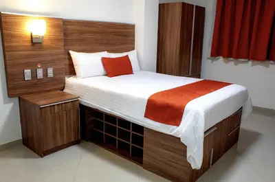 Cama o camas de una habitación en La Casa del Reloj - Zona de Hospitales